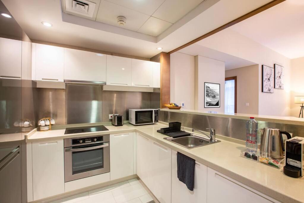 Appartamento Lux 1Br 2 Min To Burj Khalifa Dubai Esterno foto